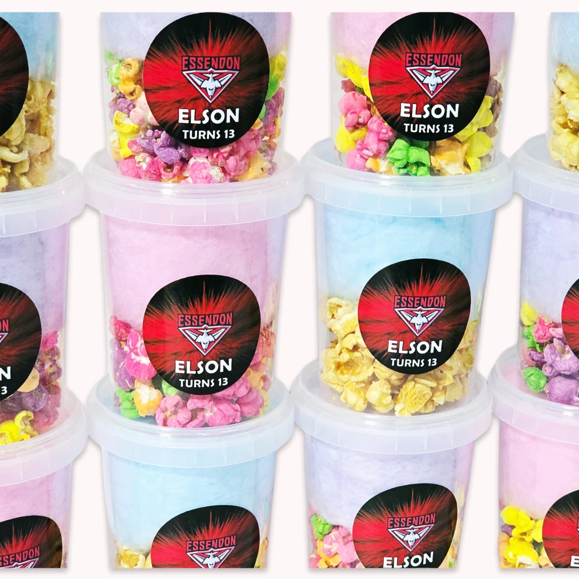 Personalised AFL football themed fairy floss popcorn party favours with Essendon colours and birthday label.