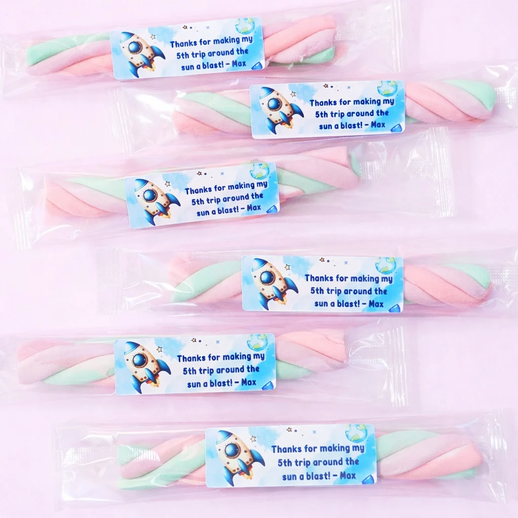 Marshmallow twists with personalised labels for party orders