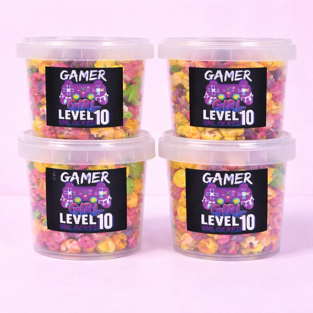 Personalised rainbow popcorn tubs with gamer girl birthday labels