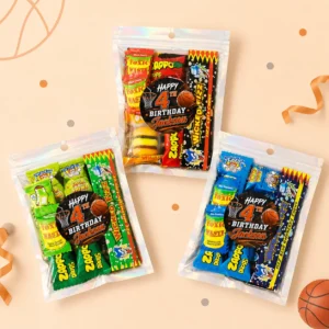 Basketball personalised lolly bags prefilled with assorted lollies and finished with custom orange and black labels for a 4th birthday
