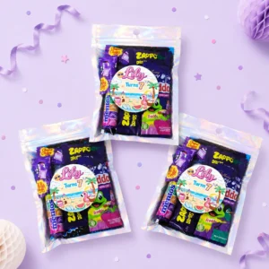 Pool party personalised lolly bags prefilled with assorted lollies and finished with custom beach-style birthday labels