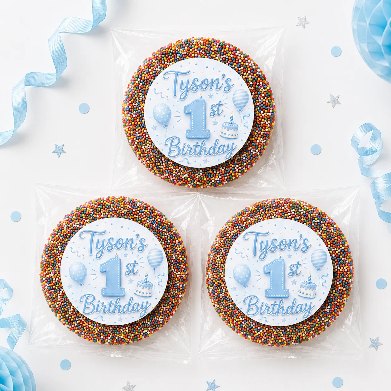 Blue 1st birthday personalised giant freckles party favours with individually packed giant chocolate freckles, rainbow sprinkles and balloon labels