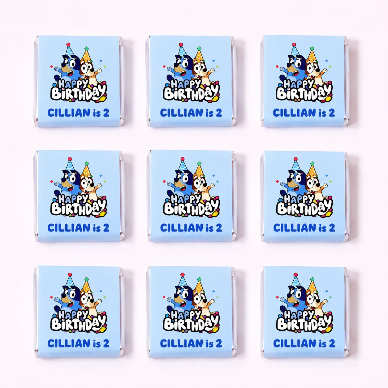 Bluey inspired personalised mini chocolates party favours with blue birthday wrappers