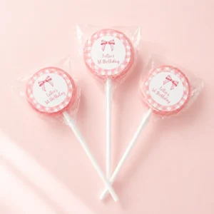 Bow personalised lollipops party favours with swirly lollipops and pink gingham bow 1st birthday labels