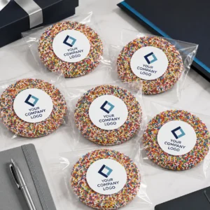Branded chocolate freckles with custom logo labels for corporate event treats, client gifts, meetings and business promotional sweets