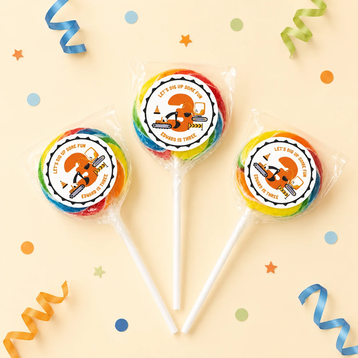 Construction personalised lollipops party favours with swirly lollipops and digger birthday labels