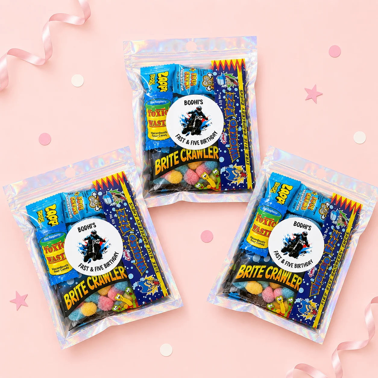 Dirt bike personalised lolly bags prefilled with assorted lollies and finished with custom motocross labels for birthday