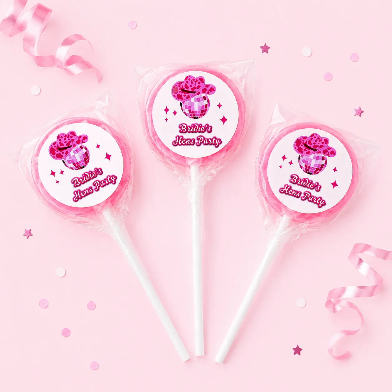 Disco Hens Night personalised lollipops party favours with swirly lollipops and pink disco cowgirl hens party labels