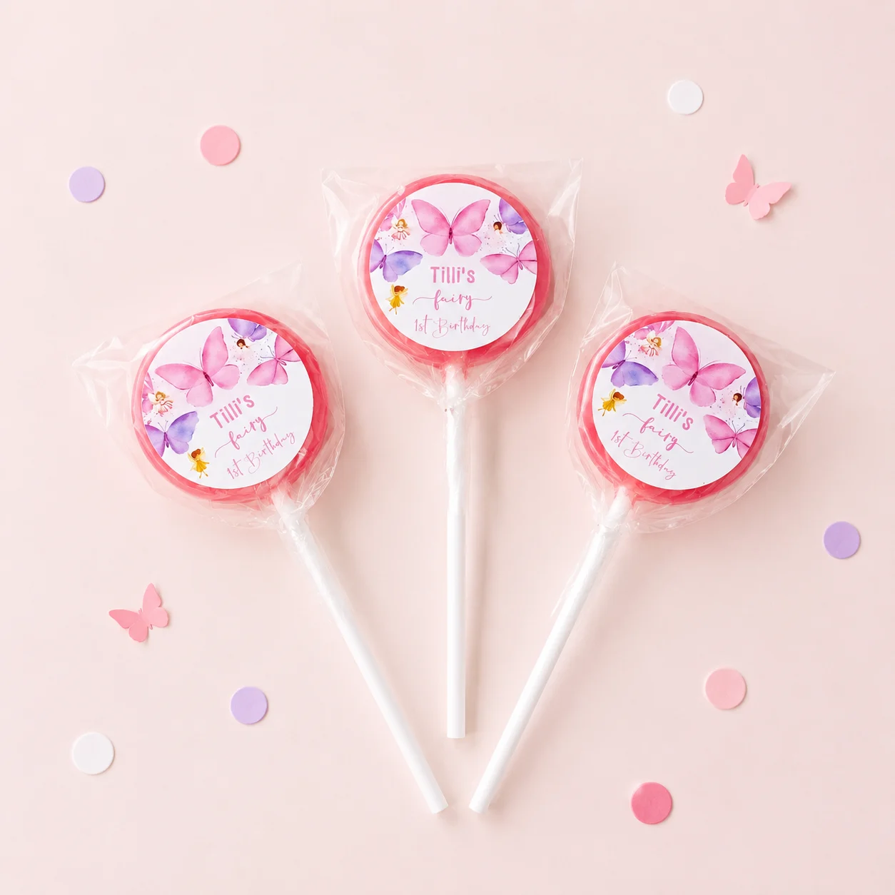 Fairy personalised lollipops party favours with swirly lollipops and fairy 1st birthday labels