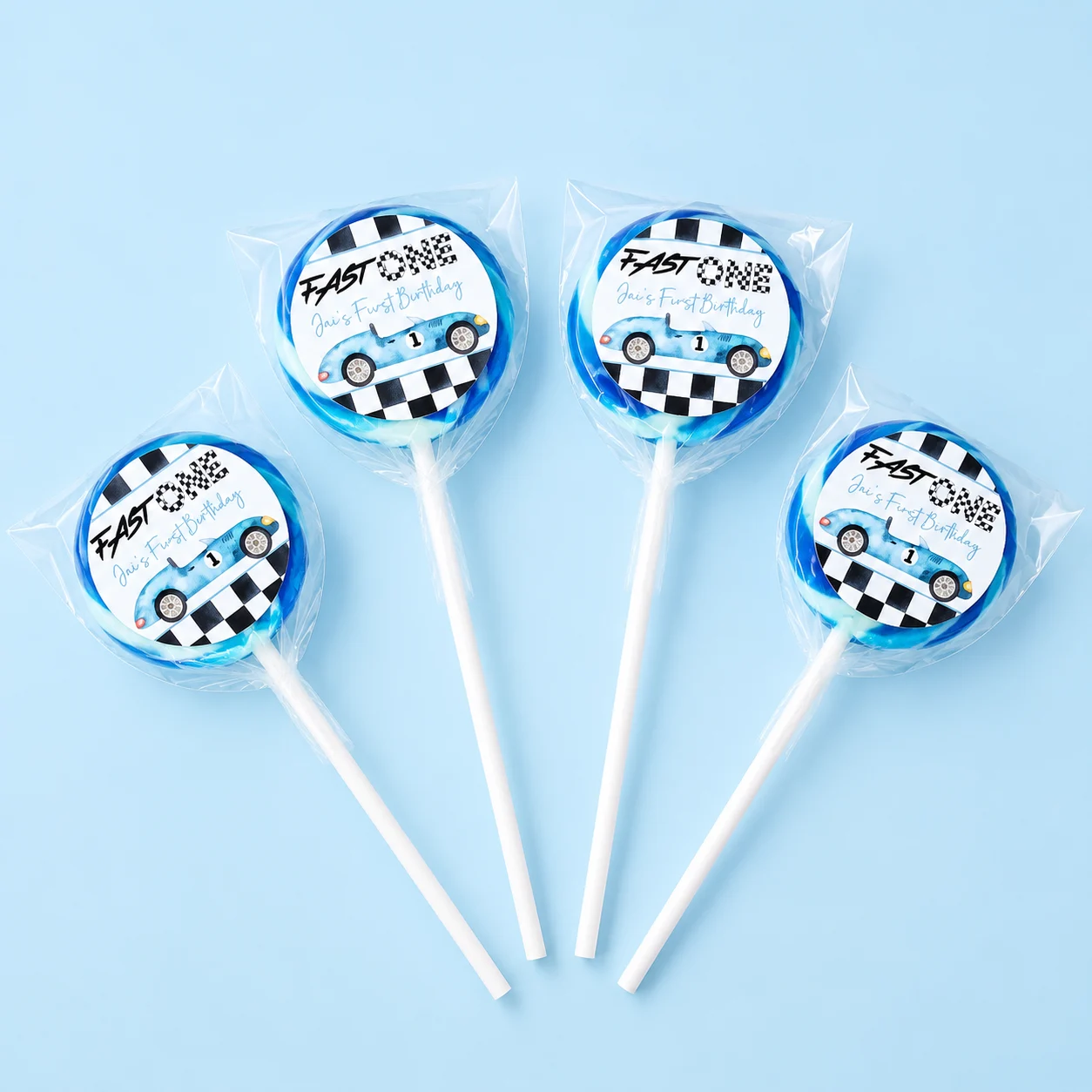 Fast One personalised lollipops party favours with race car first birthday labels
