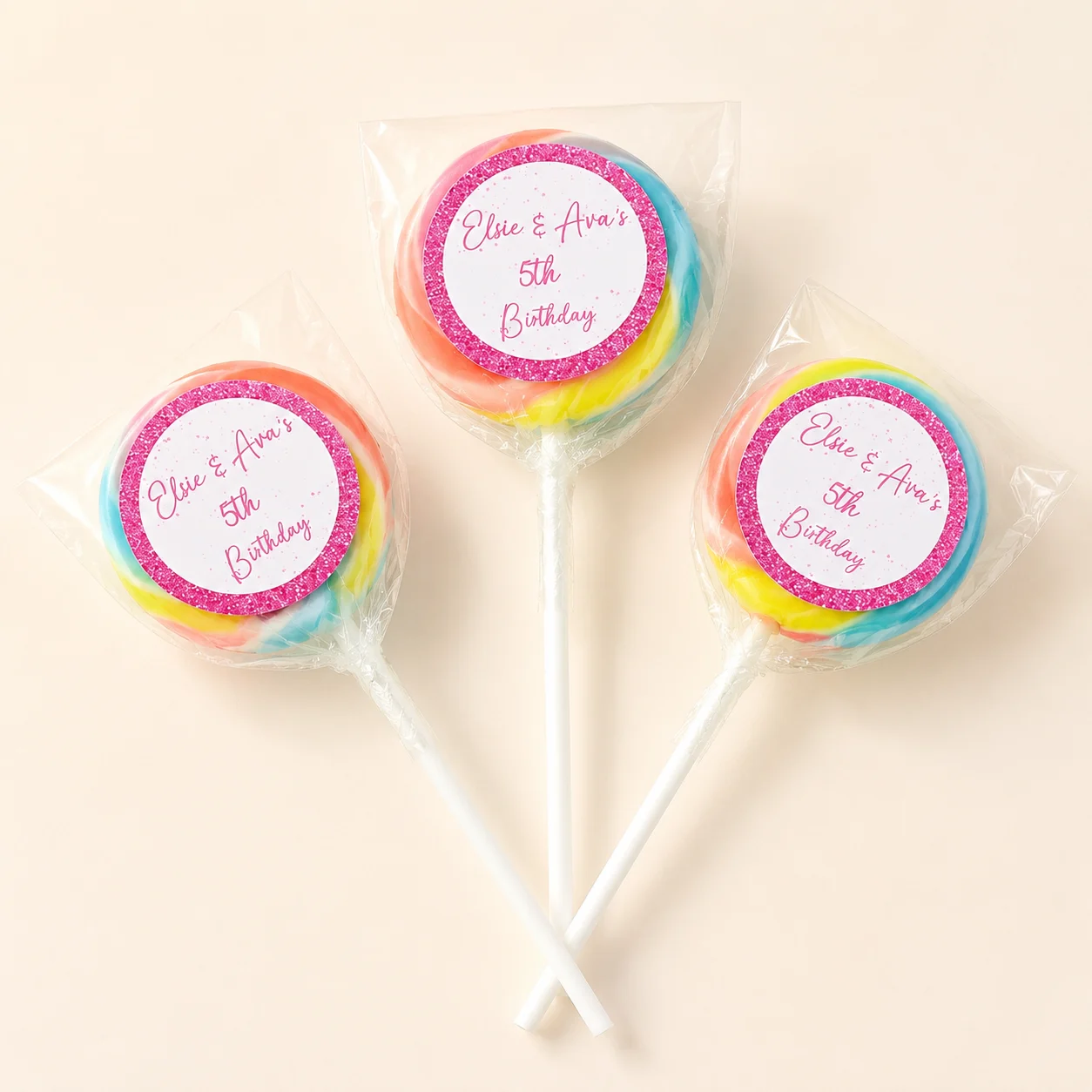 Glitter Milestone Birthday personalised lollipops party favours with swirly lollipops and pink glitter birthday labels