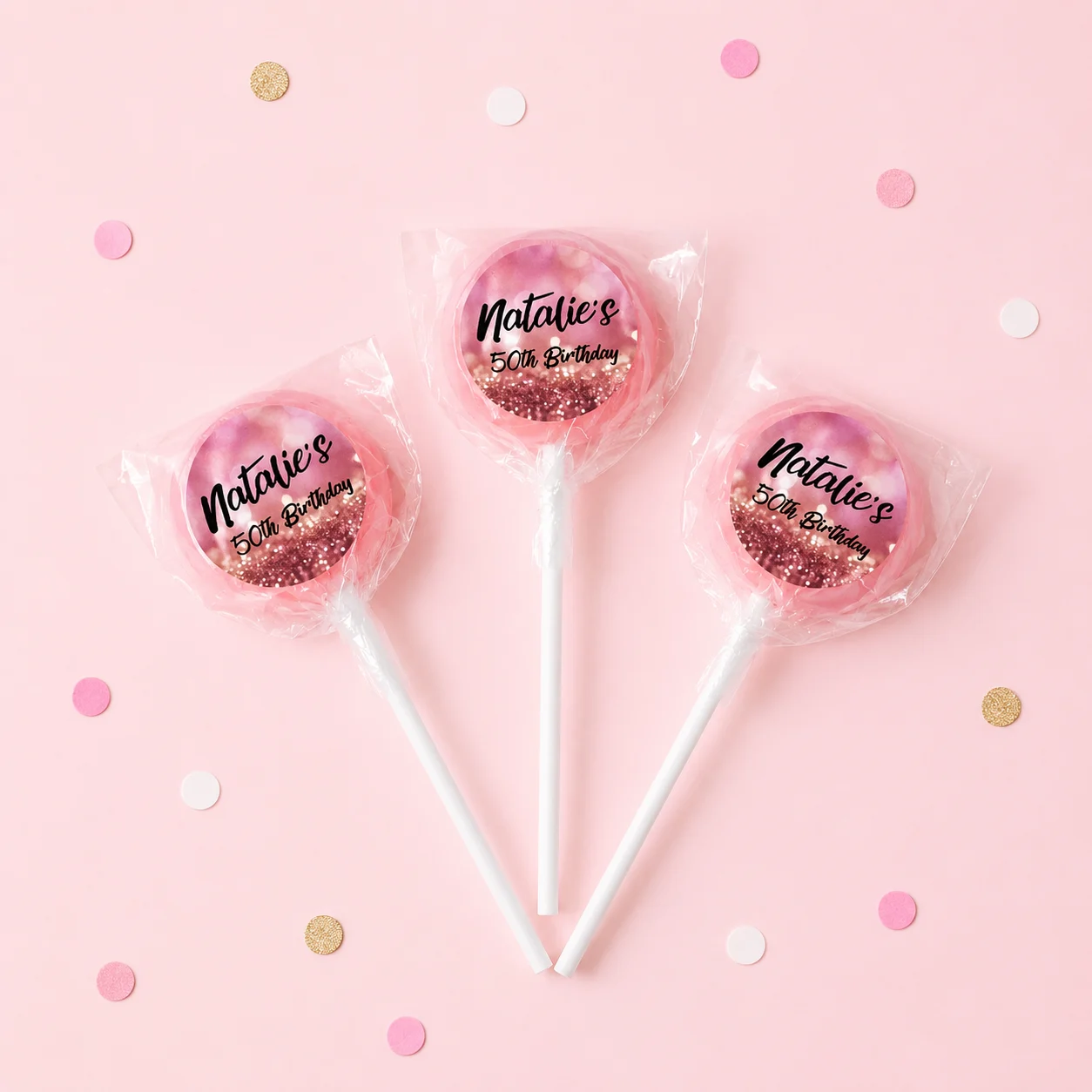 Glitter Milestone Birthday personalised lollipops party favours with swirly lollipops and rose gold 50th birthday labels