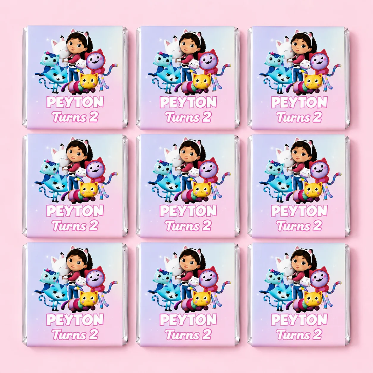 Kitty Dollhouse inspired personalised mini chocolates party favours with pink cat birthday wrappers