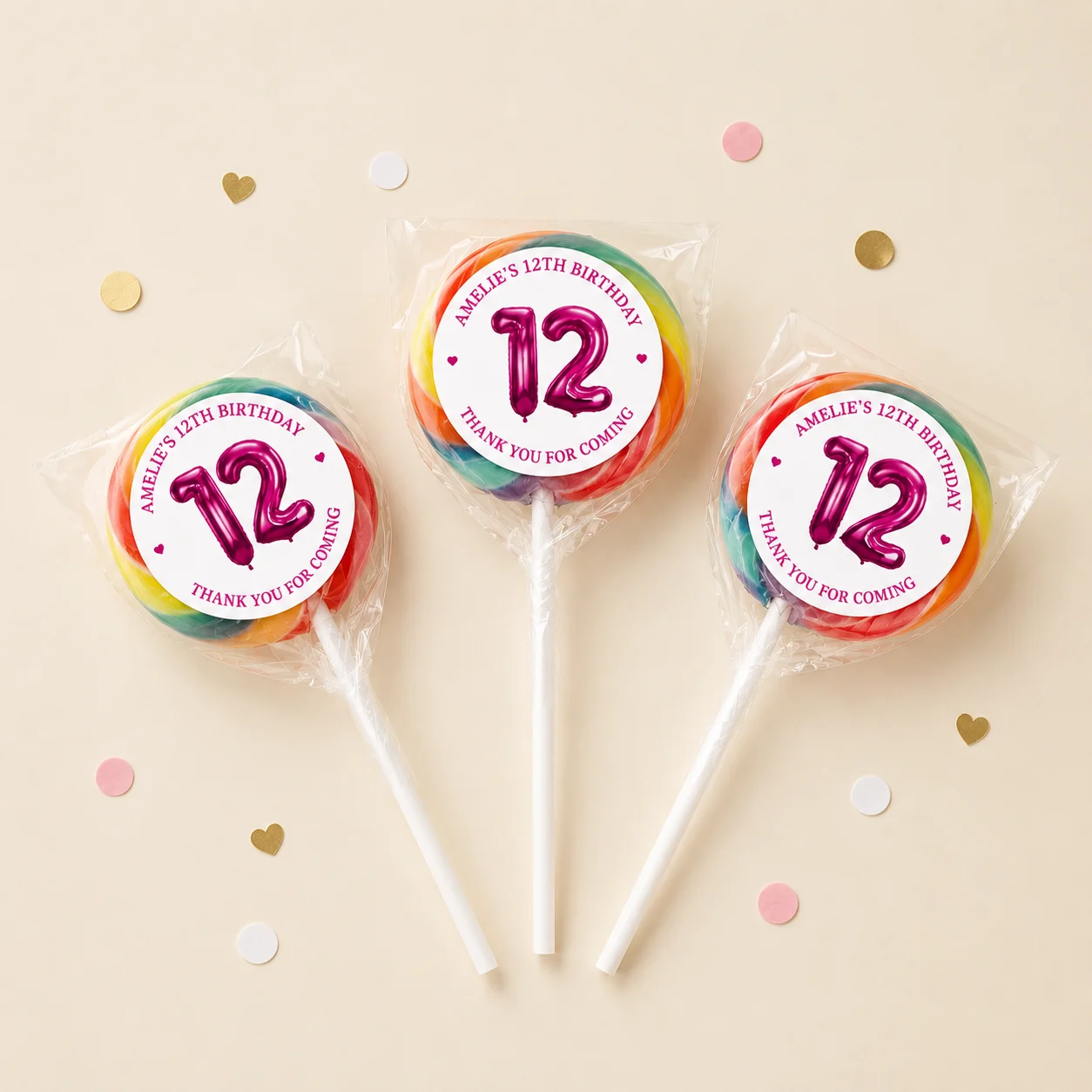 Milestone Birthday personalised lollipops party favours with swirly lollipops and pink 12th birthday labels