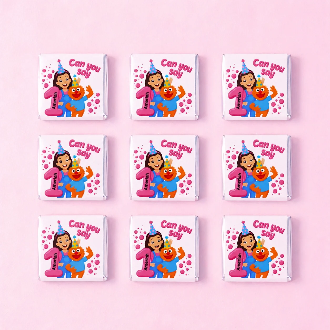 Ms Rachel inspired personalised mini chocolates party favours with pink 1st birthday learning theme wrappers
