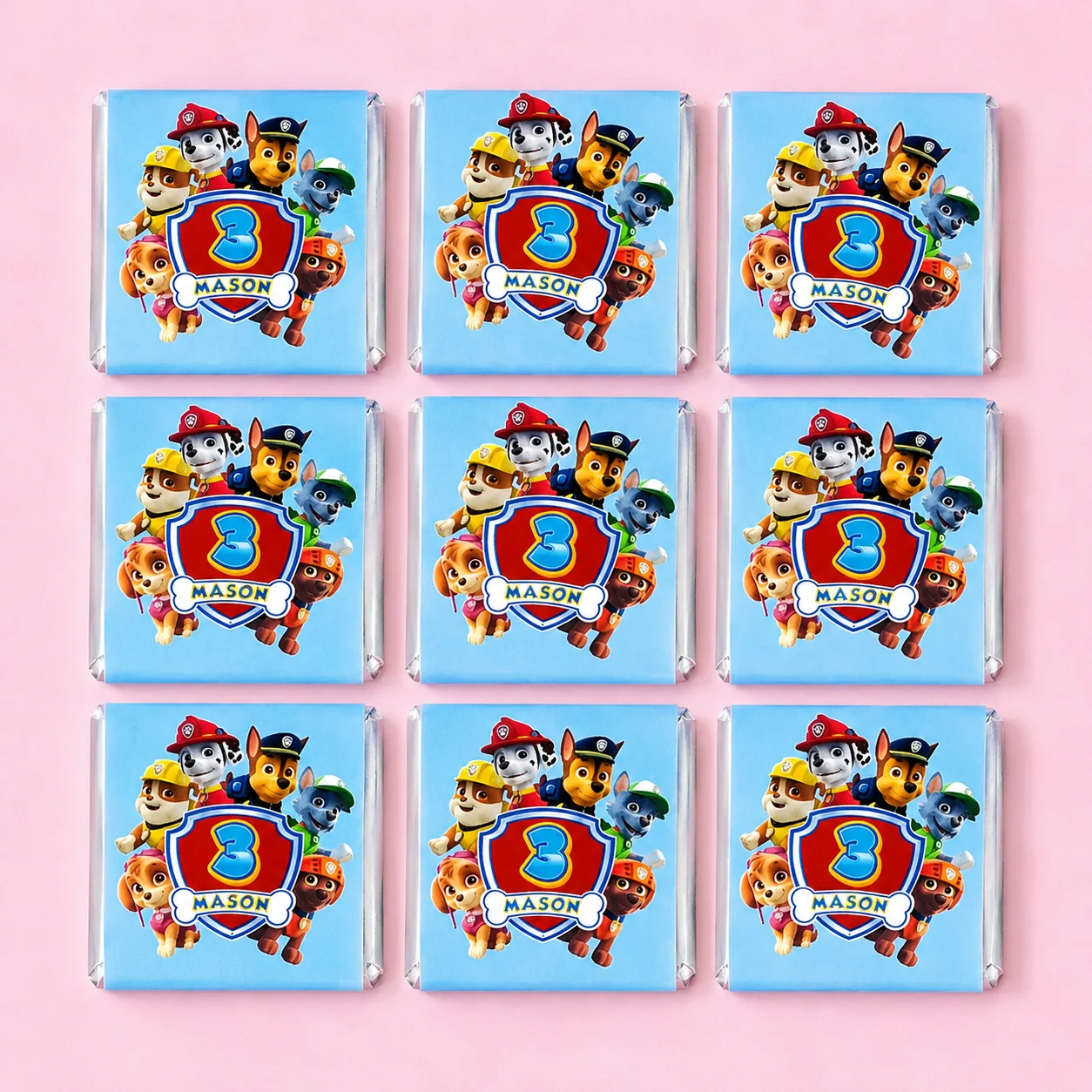 Paw Patrol inspired personalised mini chocolates party favours with blue puppy rescue birthday wrappers