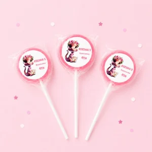 Pink Dino personalised lollipops party favours with swirly lollipops and cute dinosaur birthday labels