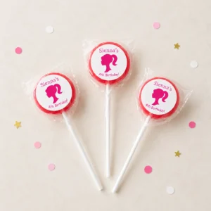 Pink Doll personalised lollipops party favours with swirly lollipops and pink doll birthday labels