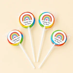 Rainbow personalised lollipops party favours with swirly lollipops and thank you rainbow labels