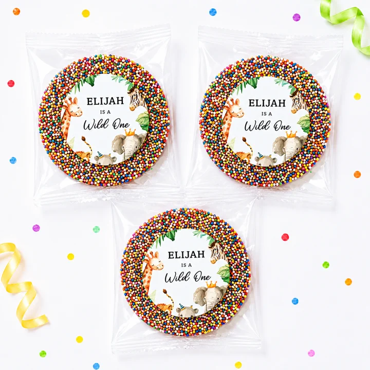 Safari personalised giant freckles party favours with individually packed giant chocolate freckles, rainbow sprinkles and wild one birthday labels