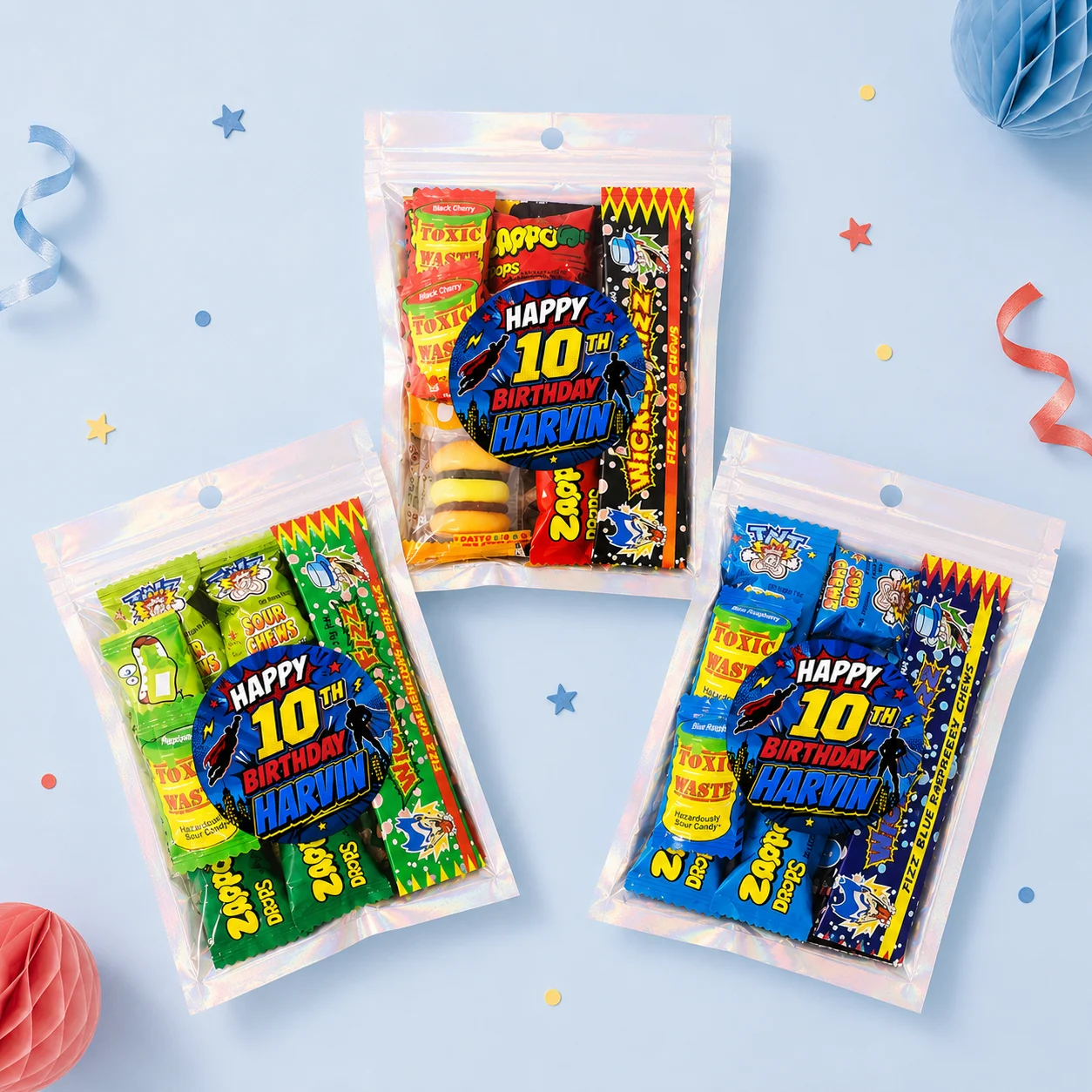 Superhero personalised lolly bags prefilled with assorted lollies and finished with custom comic-style labels for a 10th birthday