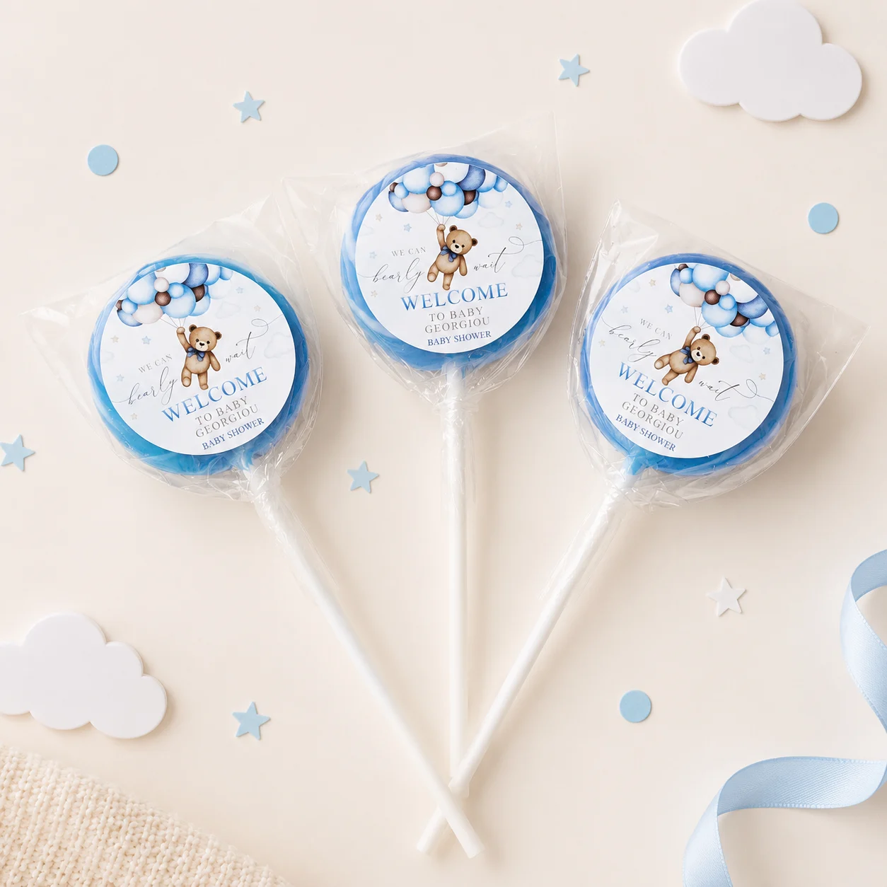 Teddy Bear Baby Shower personalised lollipops party favours with swirly lollipops and blue teddy bear baby shower labels