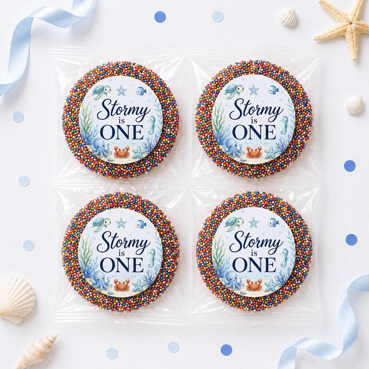 Under the sea personalised giant freckles party favours with giant chocolate freckles, rainbow sprinkles and 1st birthday ocean labels