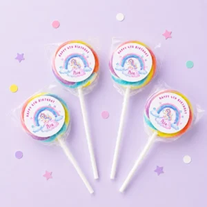 Unicorn personalised lollipops party favours with swirly lollipops and rainbow unicorn birthday labels