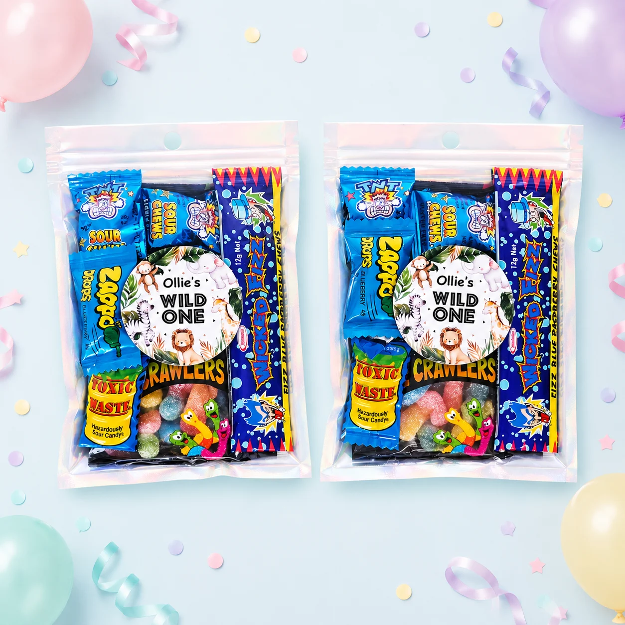 Wild One personalised lolly bags prefilled with assorted lollies and finished with custom safari animal labels for a 1st birthday